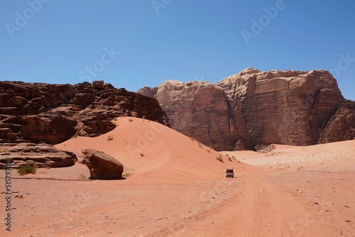 Amazing Martian scenery of Wadi Rum desert with rocks and red dunes in Jordan.