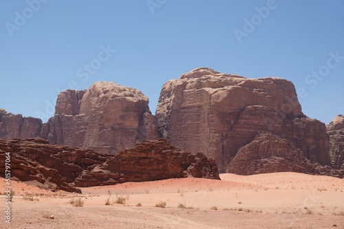 Amazing Martian scenery of Wadi Rum desert with rocks and red dunes in Jordan.