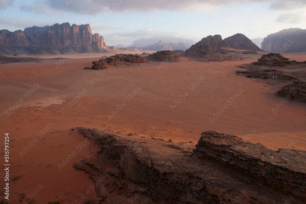 Amazing scenery of Wadi Rum desert looks like Mars. Jabal Al Qatar mountain on horizon.