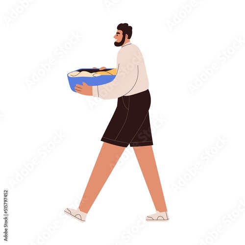 Person carrying laundry in basket. Man going with dirty clothes in container in hands, linen for washing, cleaning. Housework. Flat vector illustration isolated on white background