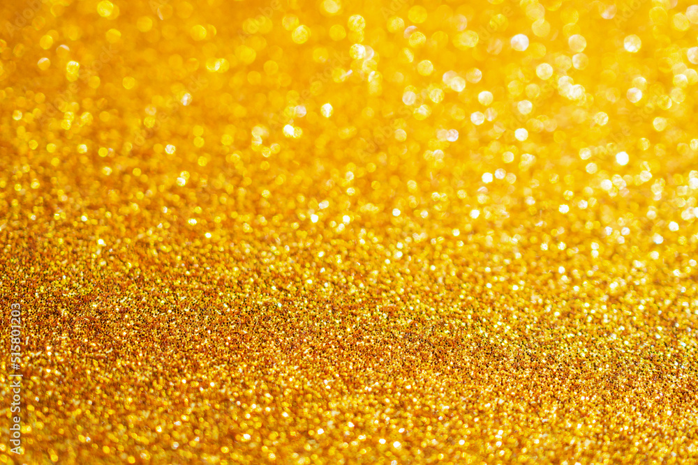 gold glitter sparkle with bokeh background gold glitter sparkle with bokeh background