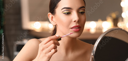 Beautiful young woman apply...