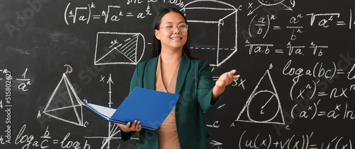 Asian female maths teacher ...