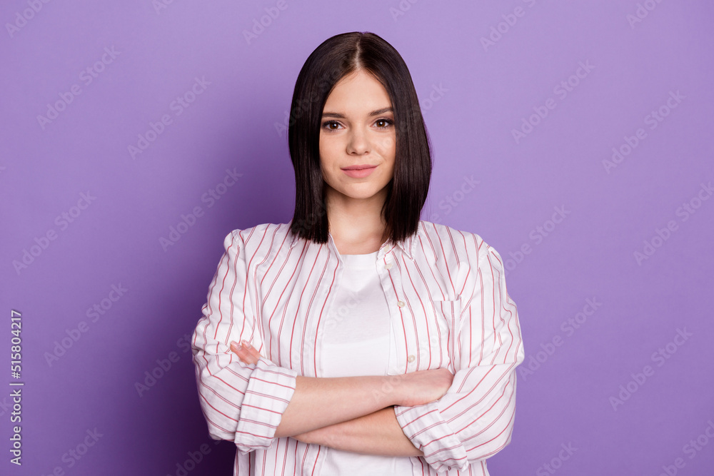 Photo of young lovely lady crossed hands manager leader intelligent isolated over violet color background Photo of young lovely lady crossed hands manager leader intelligent isolated over violet color background