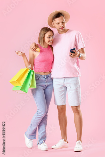 Young couple with credit ca...