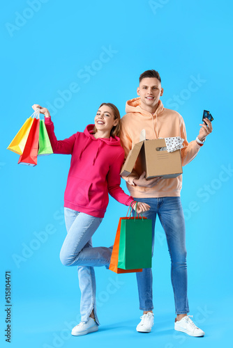 Young couple with credit ca...