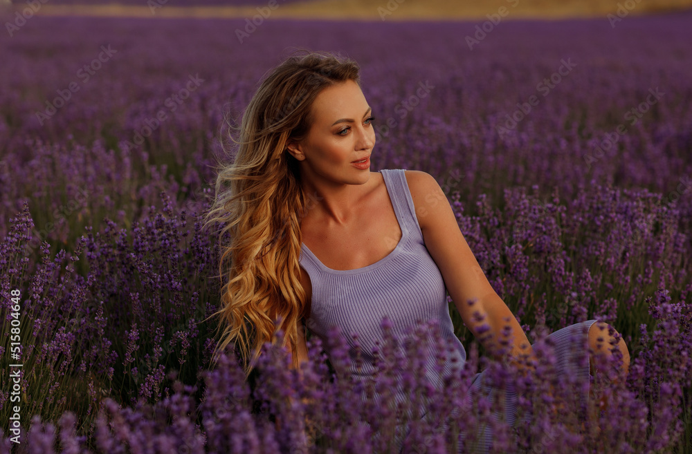 Young beautiful blonde woman in lavender field Young beautiful blonde woman in lavender field