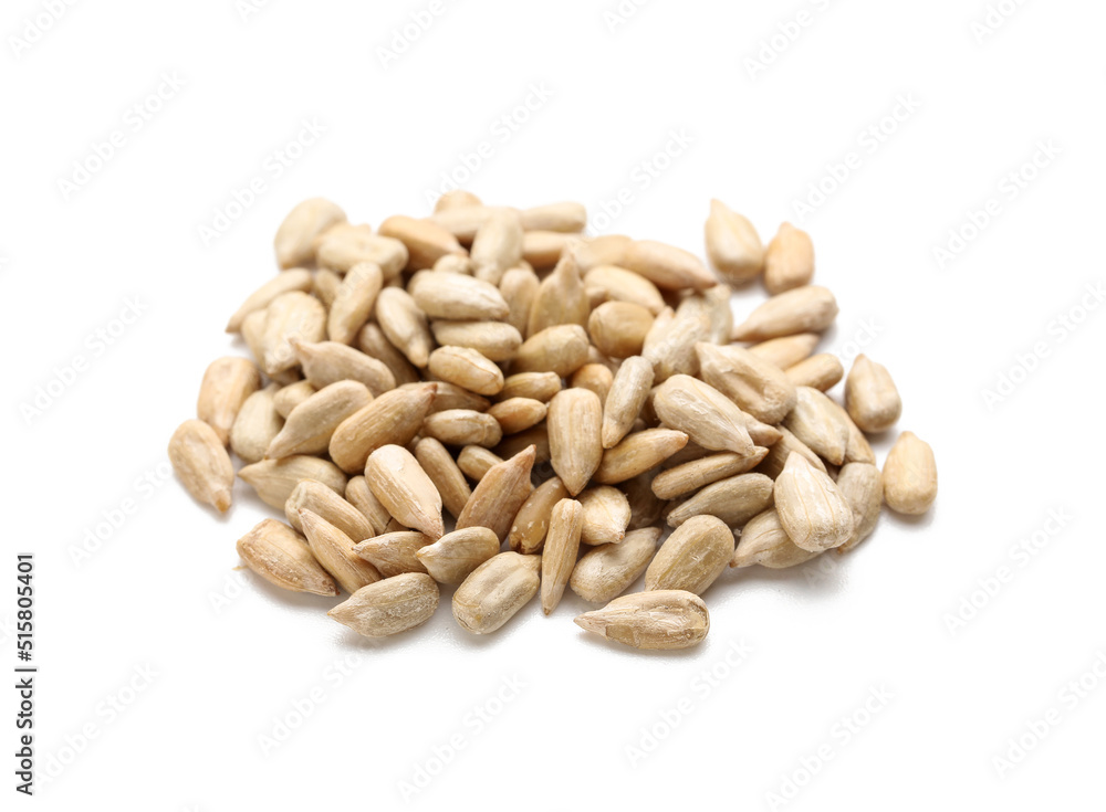 Pile of peeled sunflower seeds on white background Pile of peeled sunflower seeds on white background
