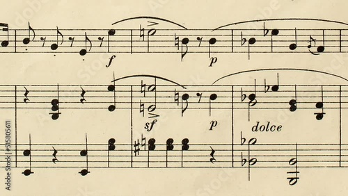 Camera slide over old yellowed music score without lyrics - real paper texture, close up