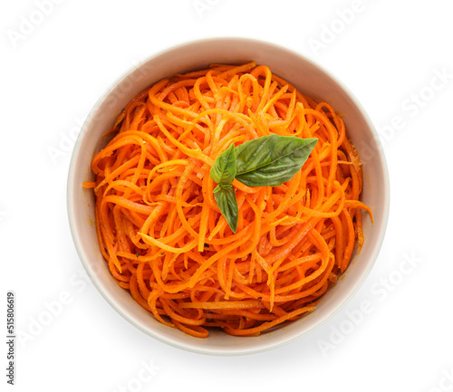 Bowl of tasty korean carrot on white background