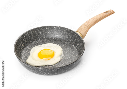 Frying pan with tasty egg isolated on white background