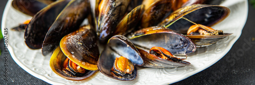 Fototapeta Naklejka Na Ścianę i Meble -  fresh mussels in shells seafood meal on the table copy space food background rustic 