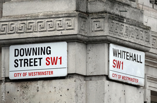 Street name signs at the junction of Downing Street and Whitehall in London, SW1.  photo