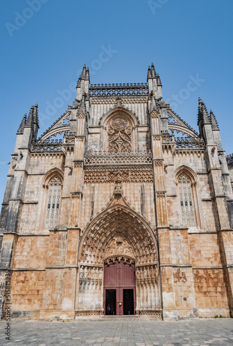 Entrance portal and Gothic facade of the Monastery of Santa Maria da Vitória in Batalha, PORTUGAL photo