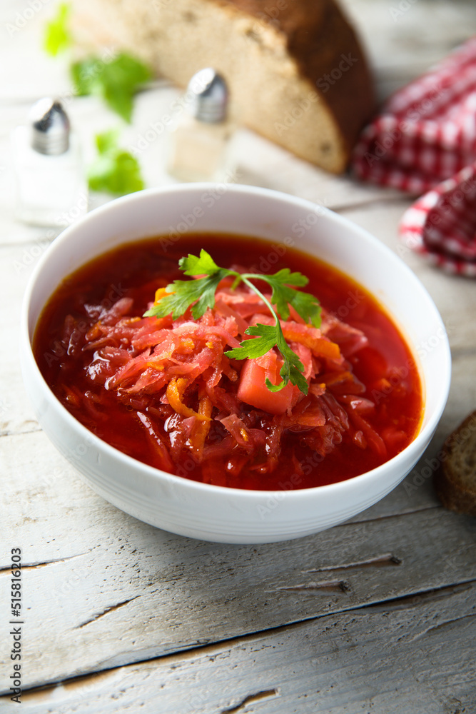 Traditional homemade beetroot soup with fresh parsley Traditional homemade beetroot soup with fresh parsley