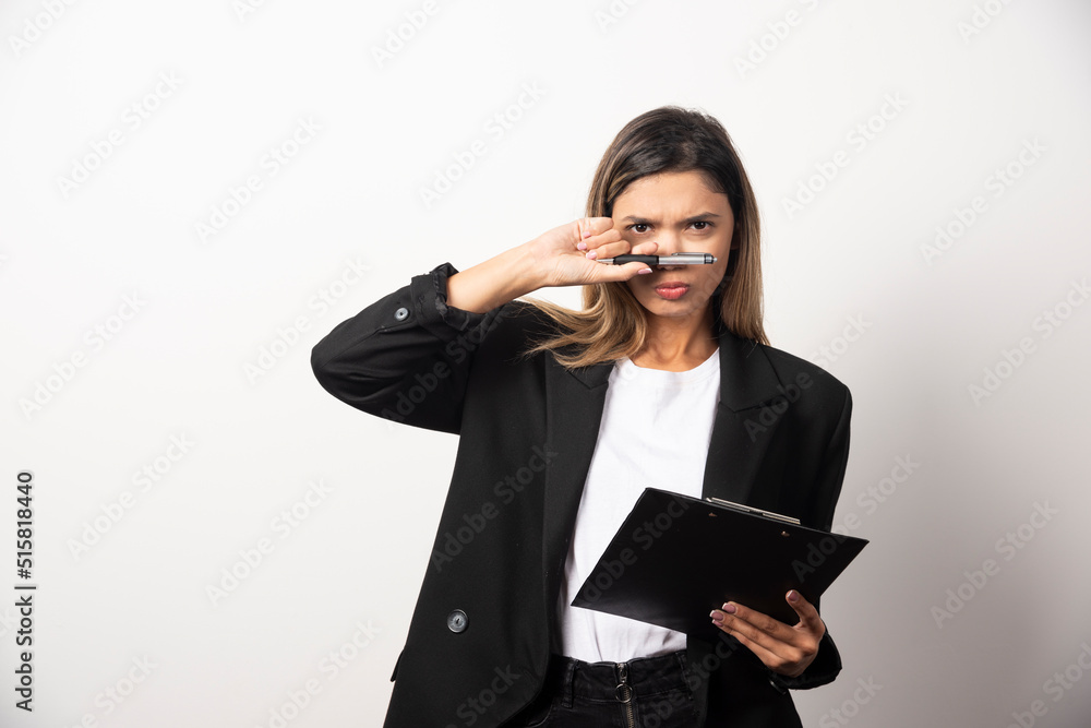Young business woman holding clipboard Young business woman holding clipboard