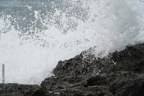 wave and splash in a sea © Matthewadobe