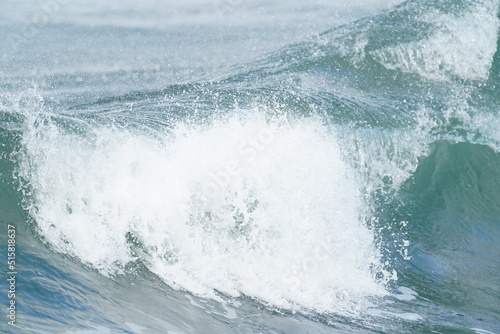 wave and splash in a sea © Matthewadobe