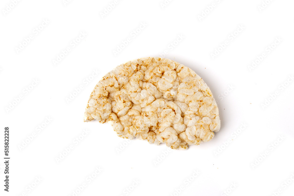 Half broken healthy puffed rice cakes isolated on white background Half broken healthy puffed rice cakes isolated on white background