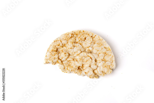 Half broken healthy puffed rice cakes isolated on white background