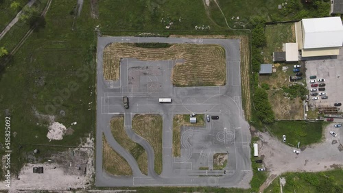 driving school with trucks at a special training ground. 4k drone footage