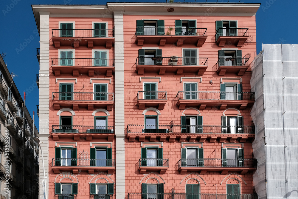 Naklejka premium Exterior buildings architecture on the Via Caracciolo ( Lungomare di Napoli a Mergellina) promenade at the Mediterranean sea shore in Naples, Italy