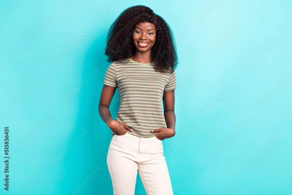 Photo of pretty charming girl dressed green t-shirt smiling empty space isolated teal color background Photo of pretty charming girl dressed green t-shirt smiling empty space isolated teal color background