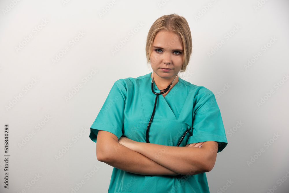 Serious doctor posing on white background Serious doctor posing on white background