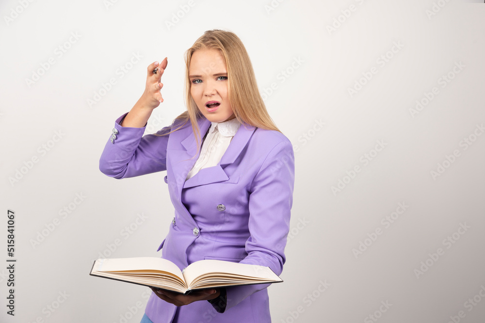 Woman holding opened tablet on white background Woman holding opened tablet on white background