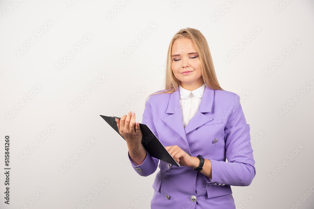 Young woman holding tablet on white background Young woman holding tablet on white background
