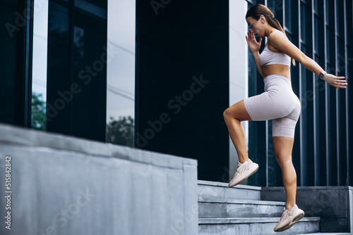 Sports woman jogging in the city