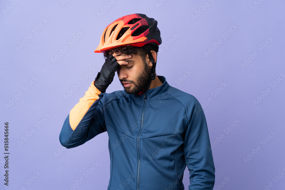 Young Moroccan cyclist man isolated on purple background has realized something and intending the solution Young Moroccan cyclist man isolated on purple background has realized something and intending the solution