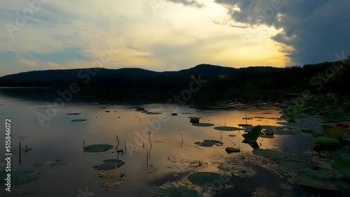 Landscape at Sunset with Rain on Lake Comabbio photo