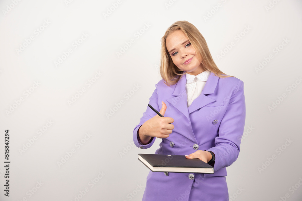 Woman holding closed clipboard on white background Woman holding closed clipboard on white background
