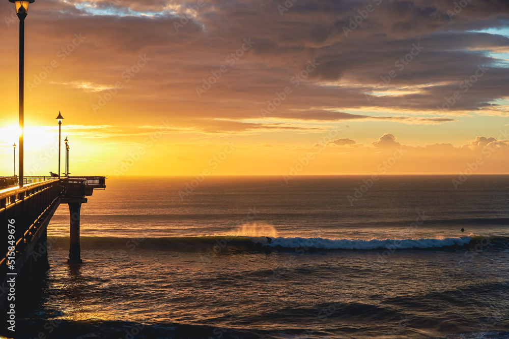 sunrise surfing at new brighton pier christchurch