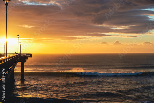 sunrise surfing at new brighton pier christchurch