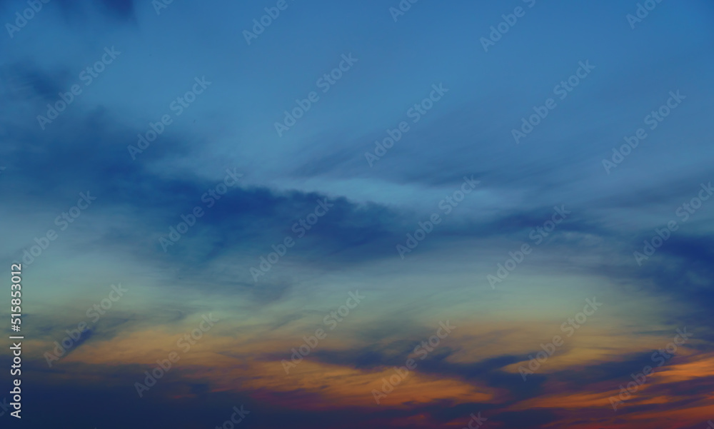 beautiful sunset sky, dark colorful clouds as abstract background