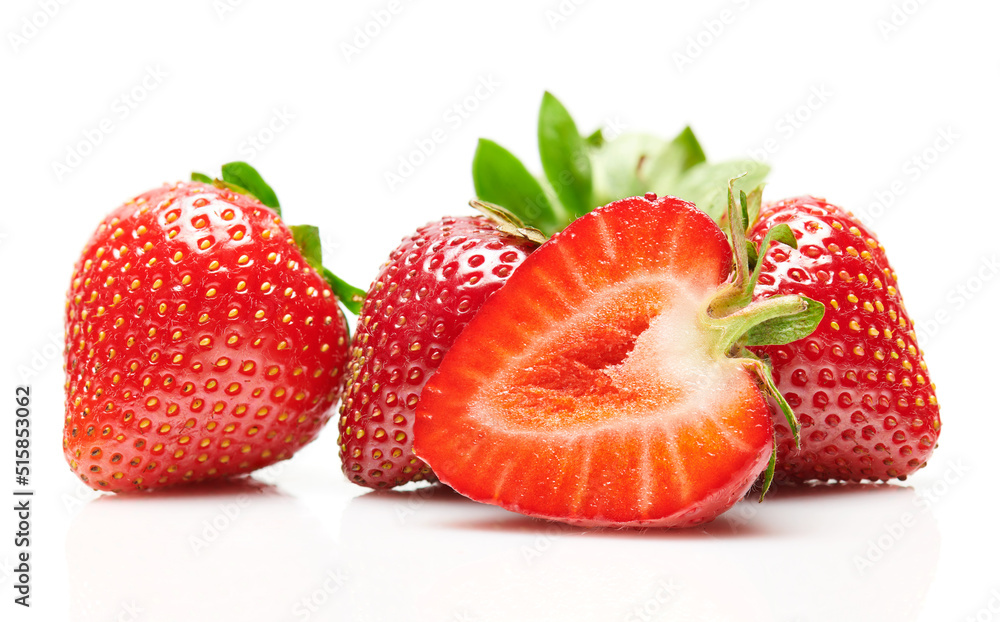 strawberries isolated on white background, red berries whole and sliced in details, concept of fresh fruits and healthy food, macro photo strawberries isolated on white background, red berries whole and sliced in details, concept of fresh fruits and healthy food, macro photo