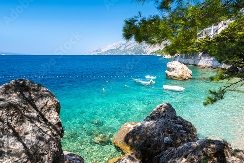 Obraz na płótnie crystal clear water of adriatic sea in Brela on Makarska riviera in Dalmatia in Croatia w salonie