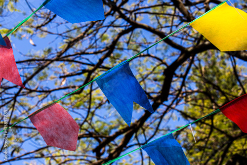 Joanópolis, São Paulo, Brasil: decoração da festa junina de São João, com bandeiras coloridas espalhadas pela praça central da cidade capital do lobisomem photo