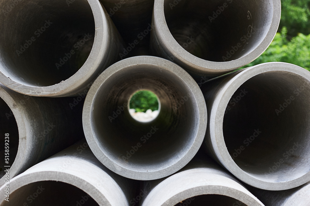 Concrete pipes to replace the city sewer system. Pipes view from the end to the lumen