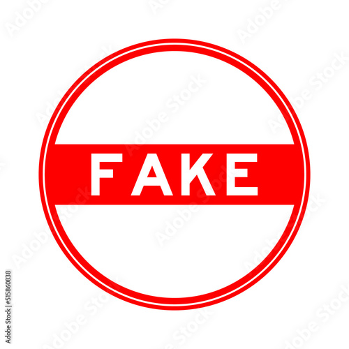Red color round seal sticker in word fake on white background
