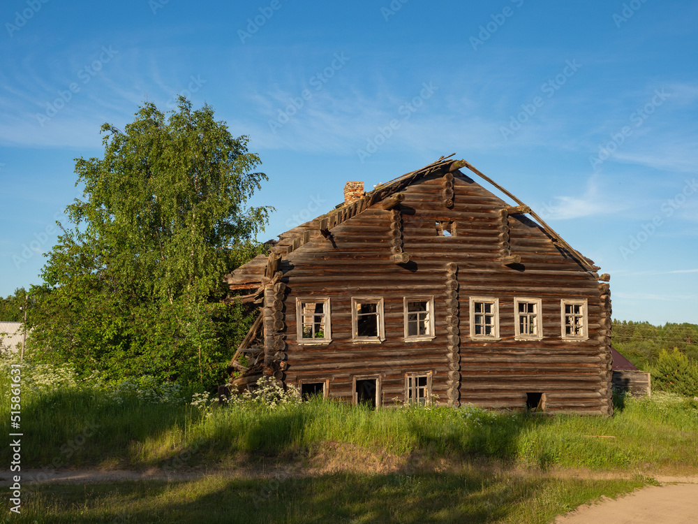 Old traditional log house in a village in the Republic of Karelia, northwest Russia Old traditional log house in a village in the Republic of Karelia, northwest Russia