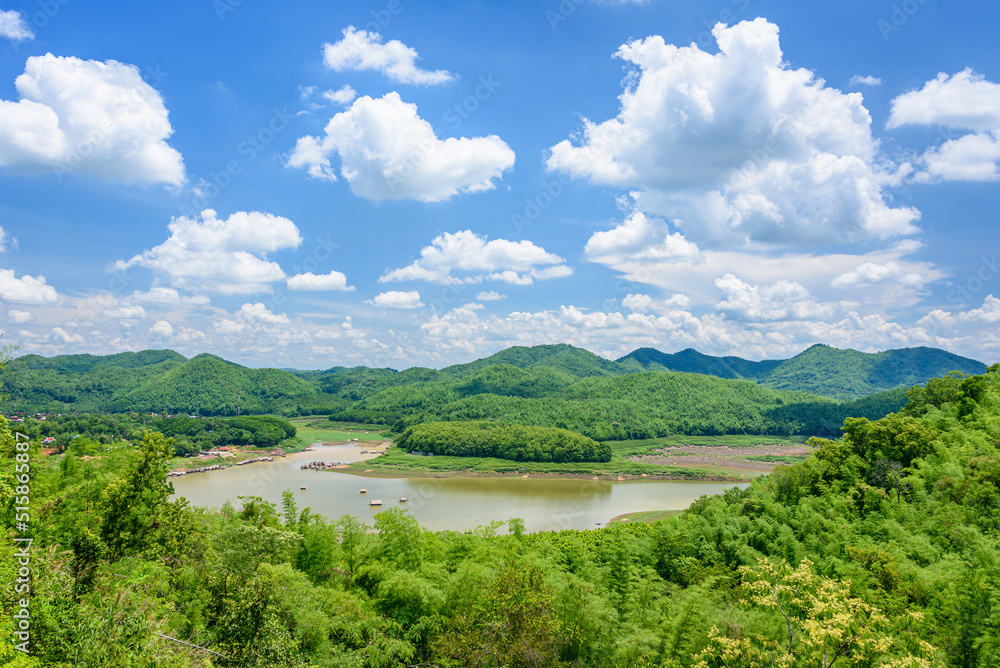 Travelers relax and enjoy the beauty of nature on summer vacation on bamboo raft, spending leisure time during lunch at Huay Krating Reservoir, Loei Province, Thailand. Travelers relax and enjoy the beauty of nature on summer vacation on bamboo raft, spending leisure time during lunch at Huay Krating Reservoir, Loei Province, Thailand.