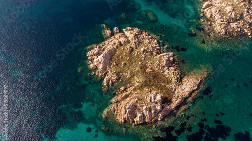 Beautiful rocky island surrounded by a emerald see in Sardinia, Italy