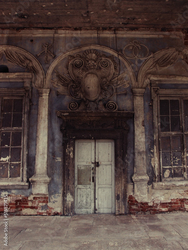 the entrance of the old house in the city of the ancient building in the center of the village 