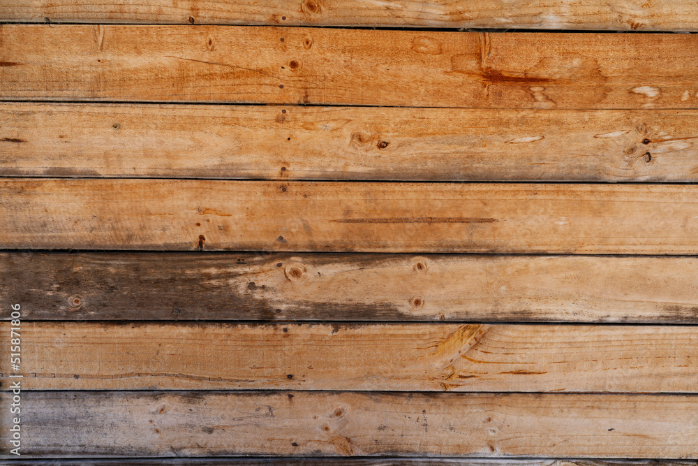 Brown wooden plank wall texture.