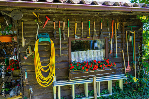 Garden Shed with Tools and Flower pots in a Garden in Lower Bavaria