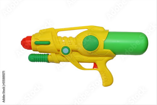 Plastic water gun isolated on white background photo