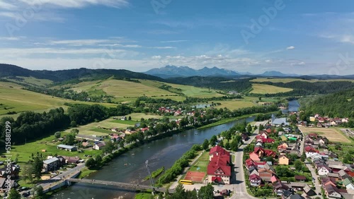 Aerial view of the bridge and the High Tatras in the village of Cerveny Klastor in Slovakia photo